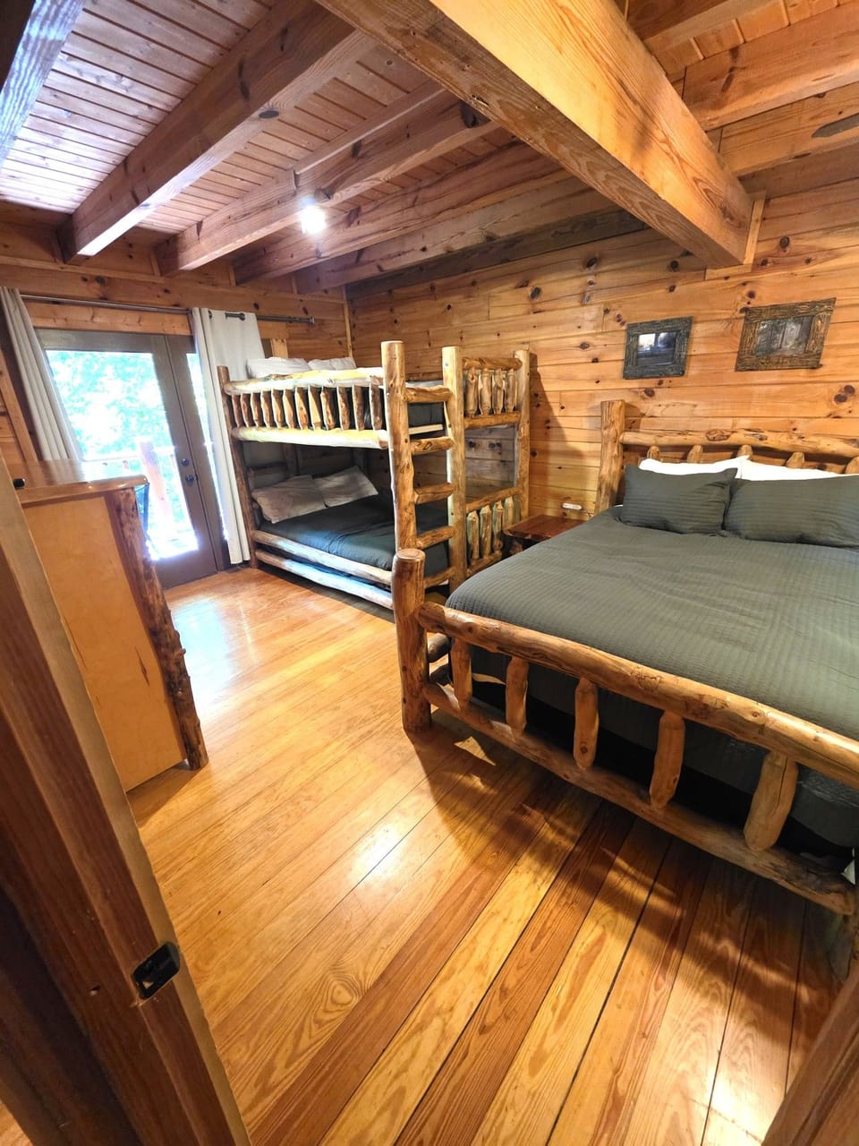 Main Level: Bedroom w/bunk beds (Full), Queen Size Bed & Twin Size window Seat