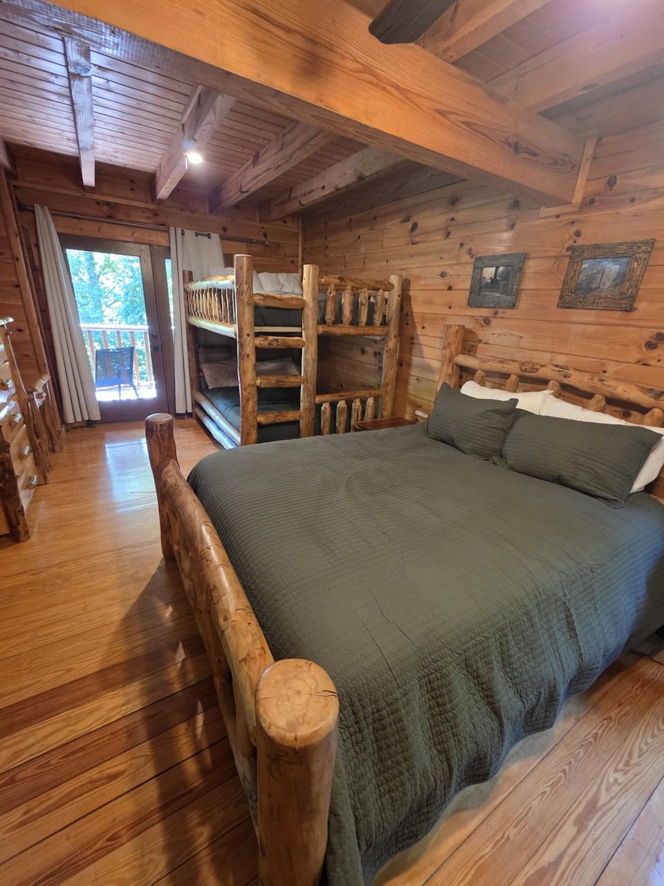 Main Level: Bedroom w/bunk beds (Full), Queen Size Bed & Twin Size window Seat