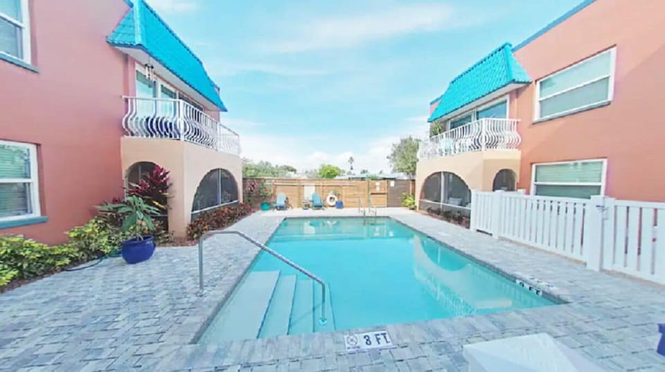 Relax on the lounge chairs near the pool.Depth:3ft-4ft. Shared with other guests