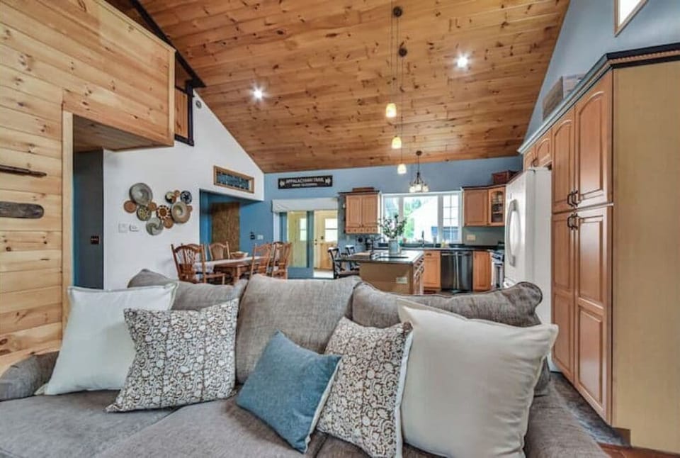 Open concept kitchen/dining/living room.