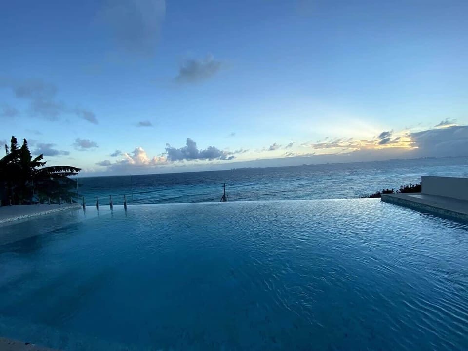Enjoy Sunsets in the infinity Pool
