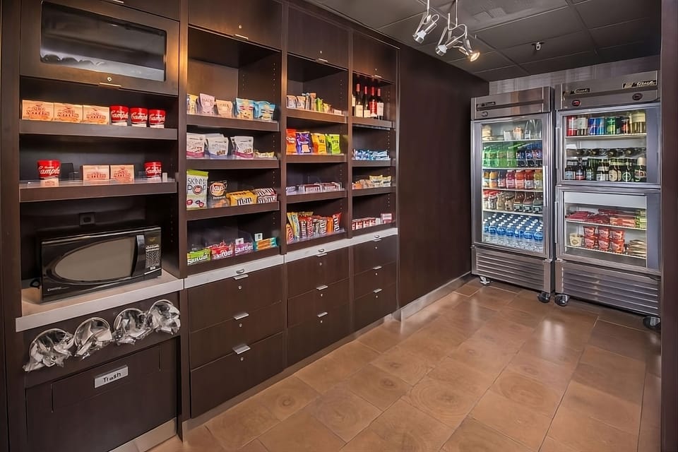 Grab snacks and essentials fast at the well-stocked pantry.