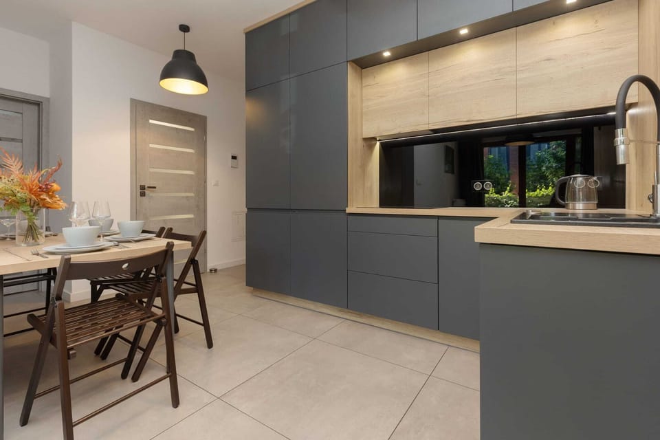 Dining and kitchen area combining elegance and functionality with modern decor.


