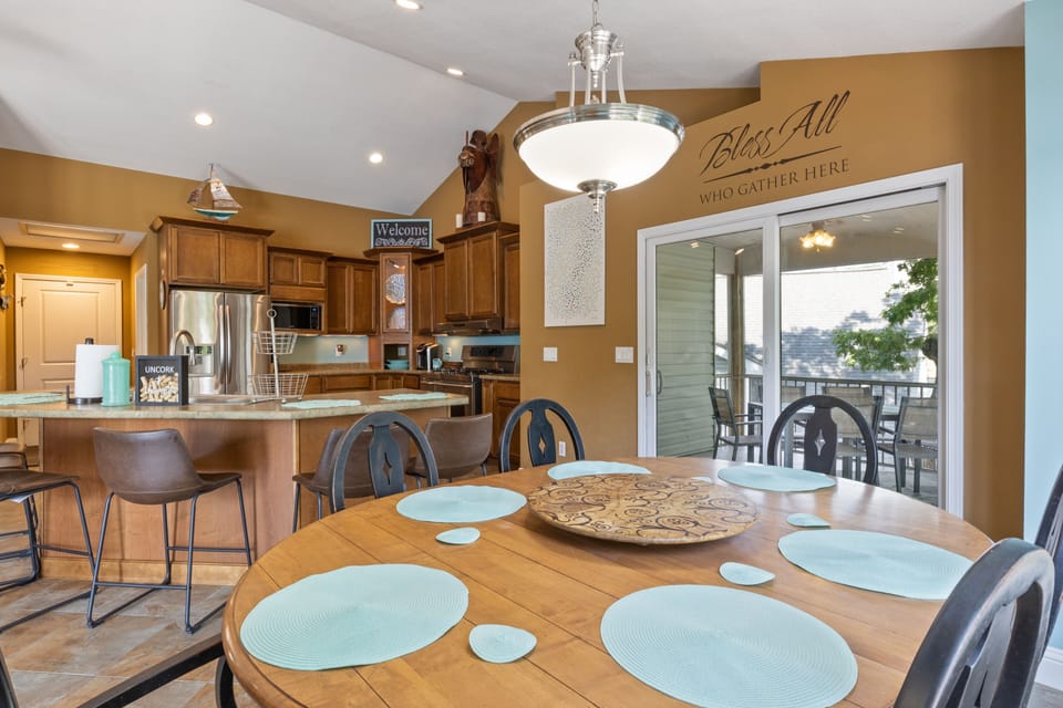 The well-appointed dining table is ready to host unforgettable dining moments during your stay.