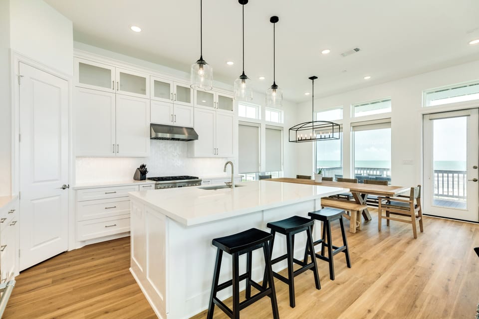 Large kitchen island is great for serving or preparing meals