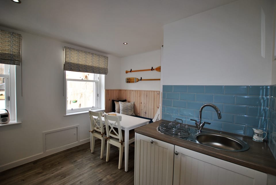 The kitchen has plenty room to cook and dine