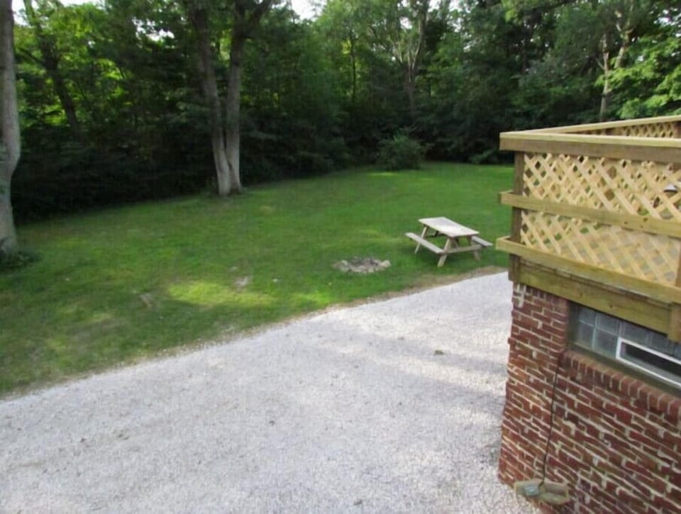Each cabin has their own personal outdoor bonfire pit with picnic table