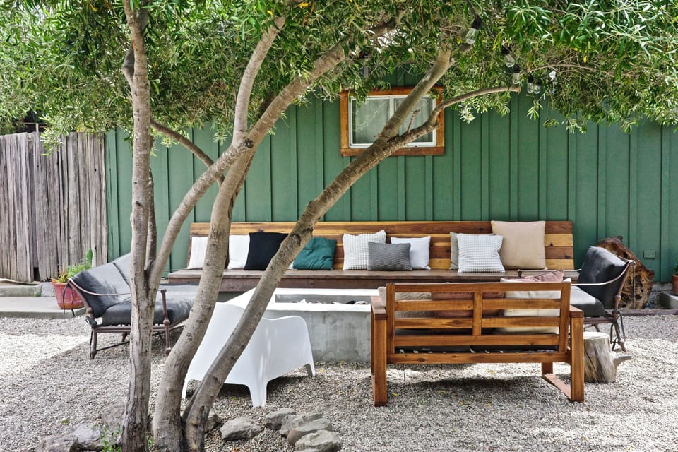 mediterranean courtyard fire pit/ sitting area