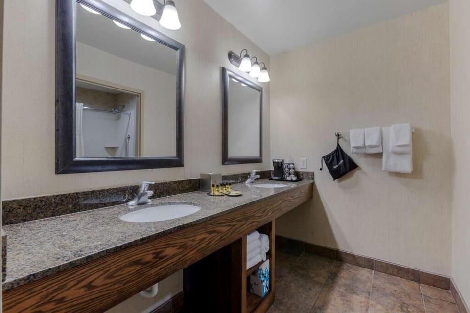 Refresh easily with a wide vanity and bright mirror lighting.