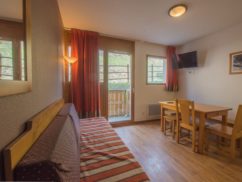 Unwind in our comfortable living room after a day full of adventures.