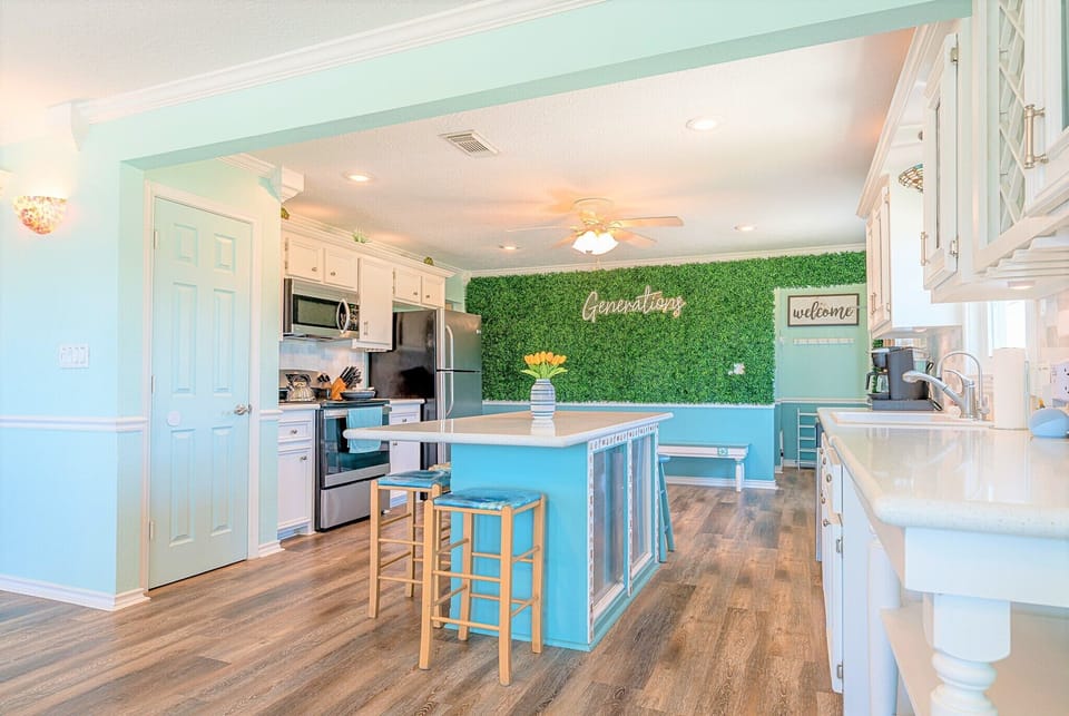 Grab a group selfie of all your generations by the grass wall in the kitchen!