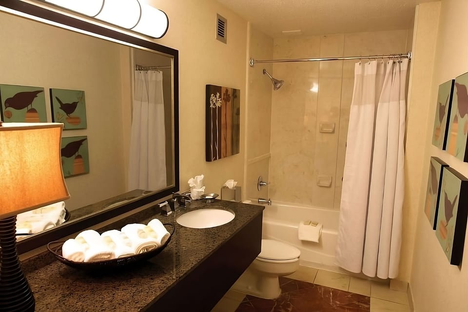 Refresh in a spotless bath with tub-shower convenience.