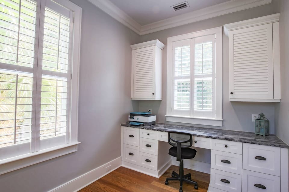 This quiet office is located off the far side of the living room.