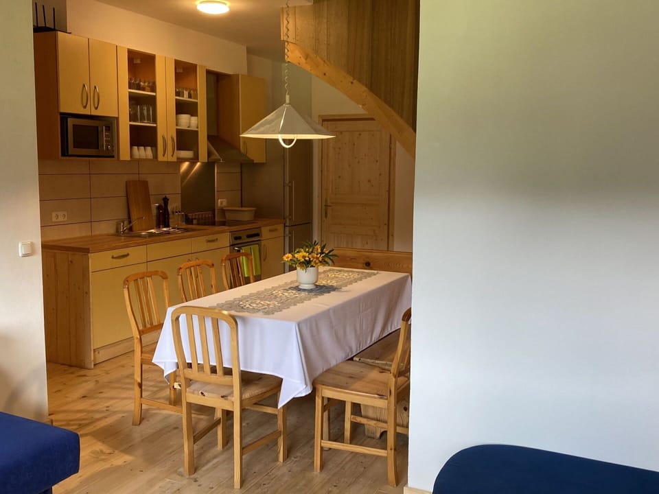 Table, Furniture, Property, Cabinetry, Chair, Kitchen & Dining Room Table, Countertop, Building, Wood, Lamp