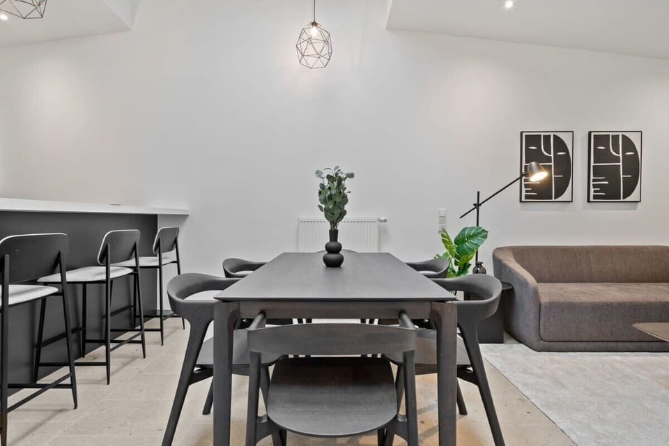 Gather at the table where chic design and comfort make every meal special.