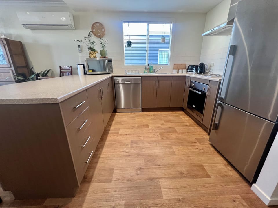 Fully stocked kitchen, all cookware, dishwasher, electric stove, condiments etc