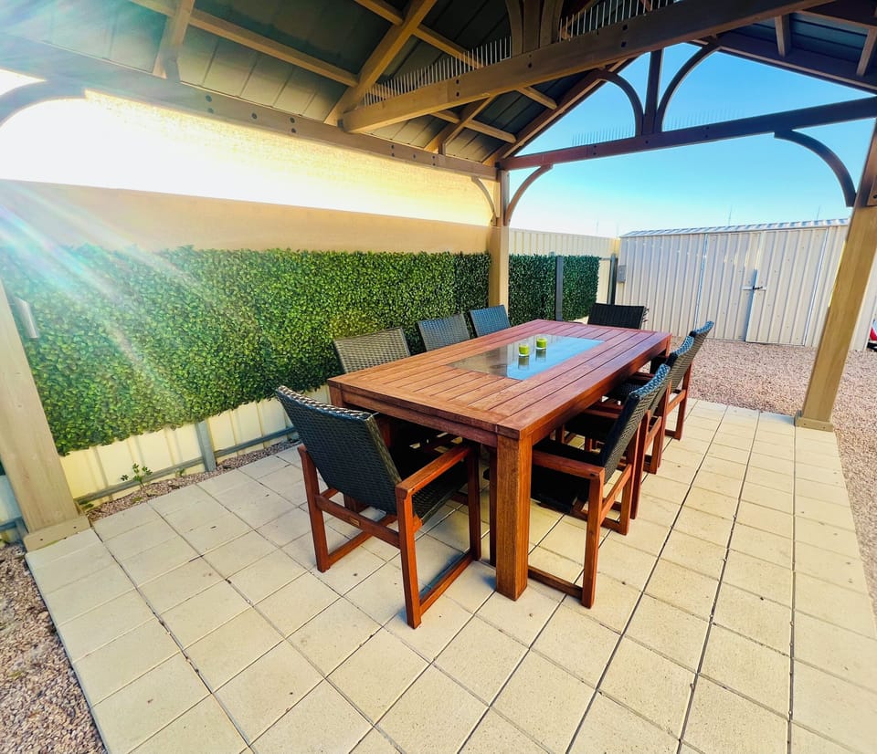 Outdoor area has bbq, fish cleaning sink, crab cooker, fire pit/heater.