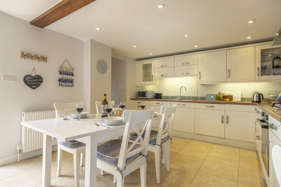 Ground floor:  A well equipped dining kitchen greets guests