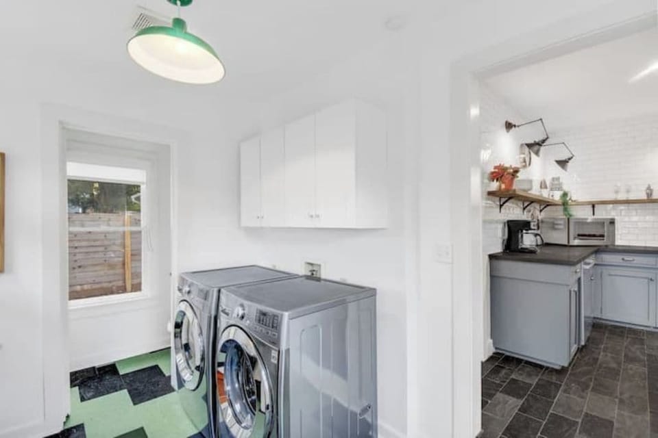 Discover convenience & privacy in our 1/2 bath water closet off the laundry area