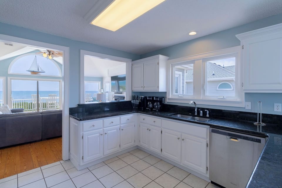Kitchen Bar - From either end of the kitchen, you can pull up a stool and a meal or the view.