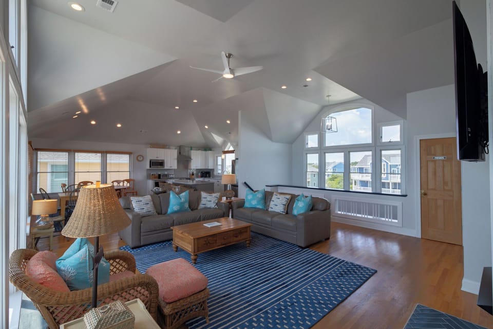Living Room - Open concept living and dining with the best views of the ocean.