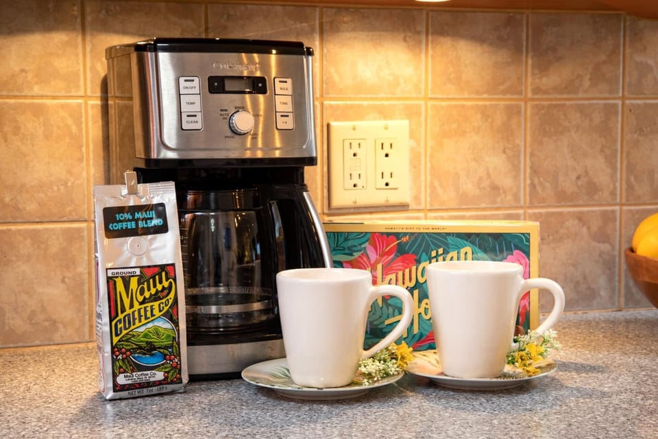 Cozy coffee station setup with mugs and tropical flair—perfect for morning starts in paradise.

