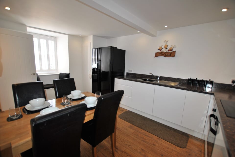 The bright dining kitchen has plenty room to cook and dine