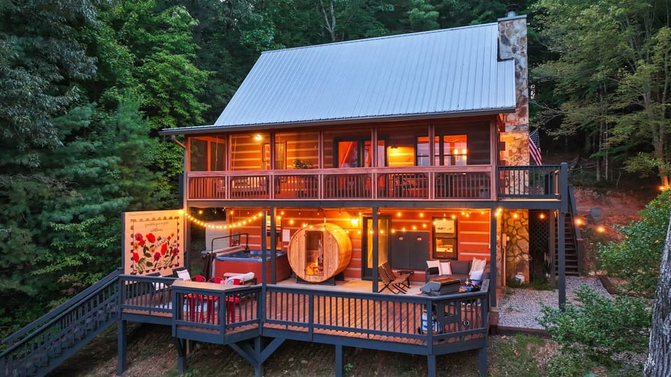 Lower level deck: hot tub, sauna, grill.
Main level deck: swing + dining table