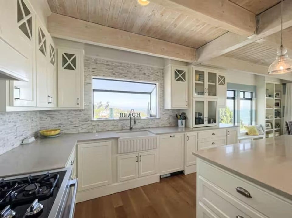 Kitchen with farm house sink and window views lookout 