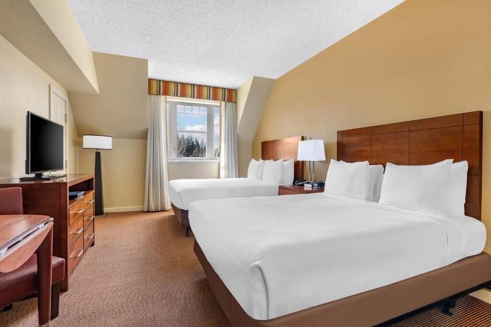 Stretch out comfortably with two queens and calming natural light.