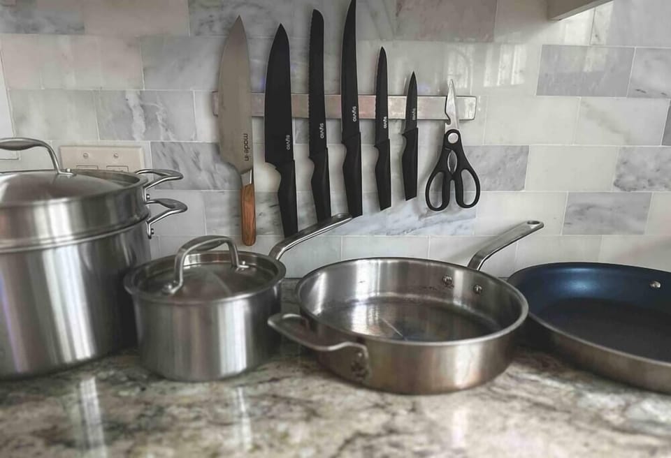 Cook like a professional chef in this kitchen, complete with chef-quality Made In cookware
