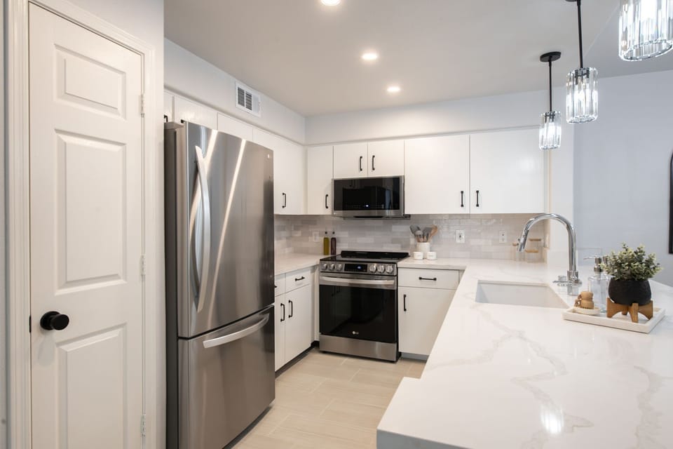 Open Kitchen with all new stainless steel appliances - Oven w/Air fryer feature