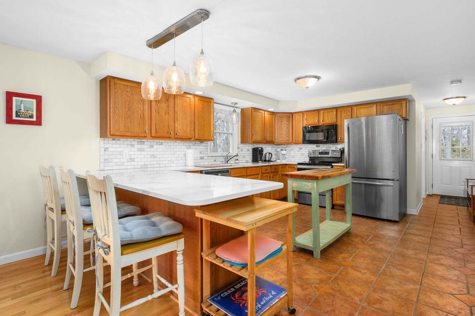 Kitchen with addition counter seating for 3