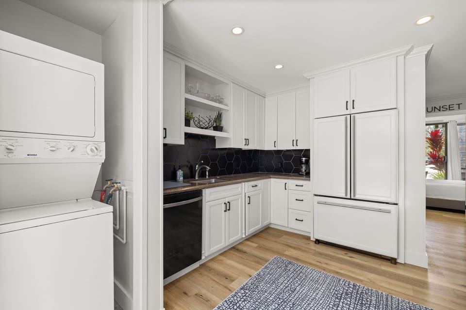 Large kitchen, fully stocked with all utensils, washer and dryer. 