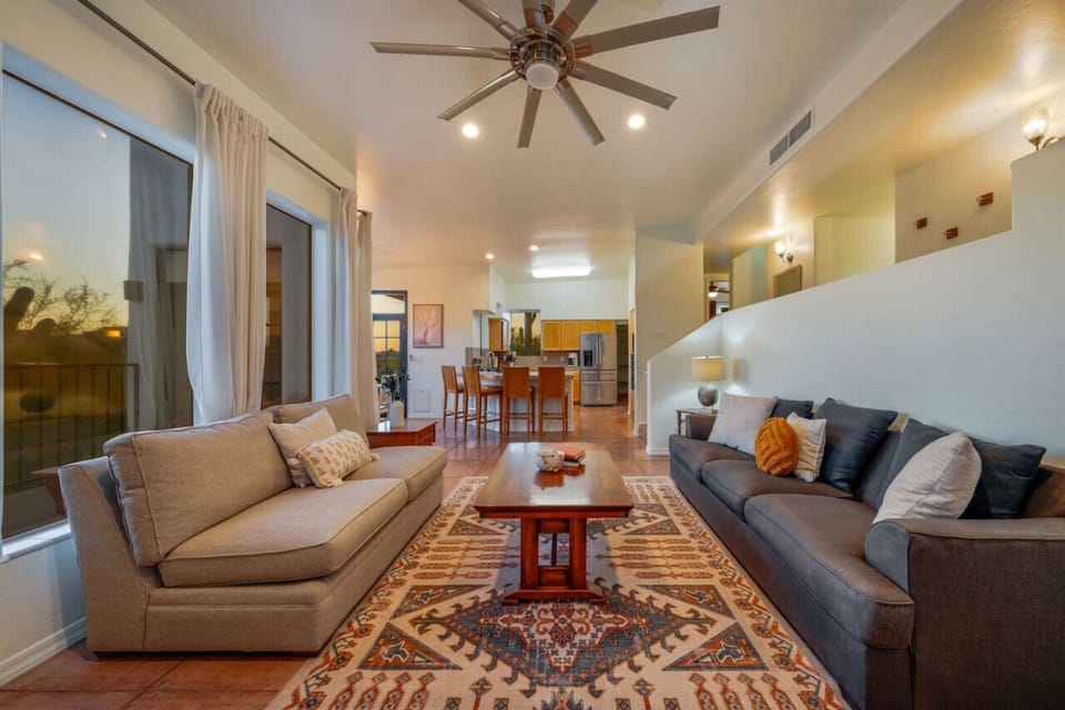 Living room leads to the dining area and well-equipped kitchen