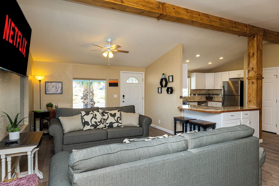 Two new, comfortable couches convert to hideabeds. Beamed ceilings