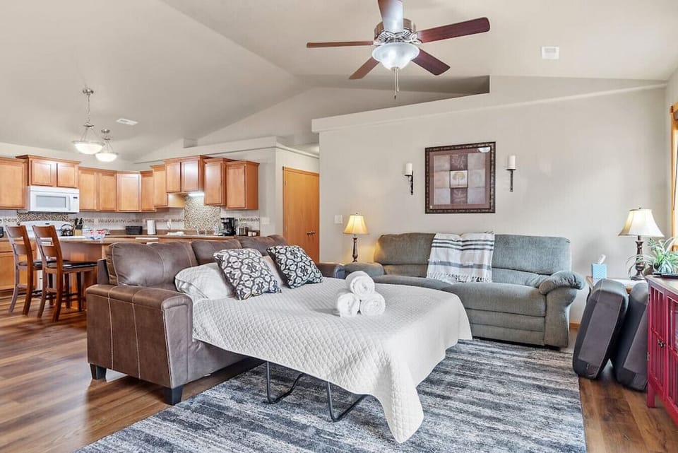 .....where you'll  find a flat-screen TV with streaming services, so you can catch up on your favorite shows! Featuring a comfortable sleeper sofa.