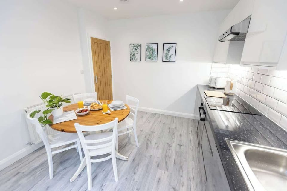 Enjoy breakfast in this spacious kitchen