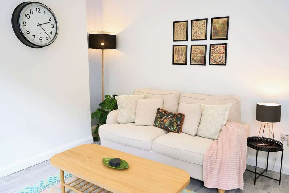 Cozy living space with stylish decor, soft lighting, and a relaxing ambiance.