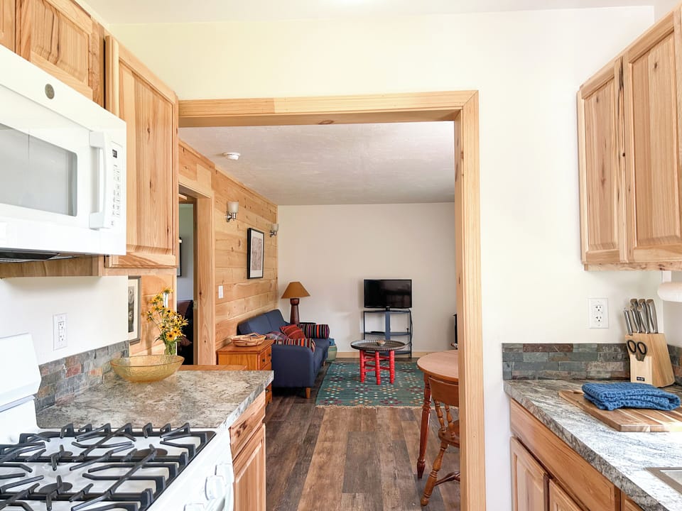 Kitchen with through view to living room