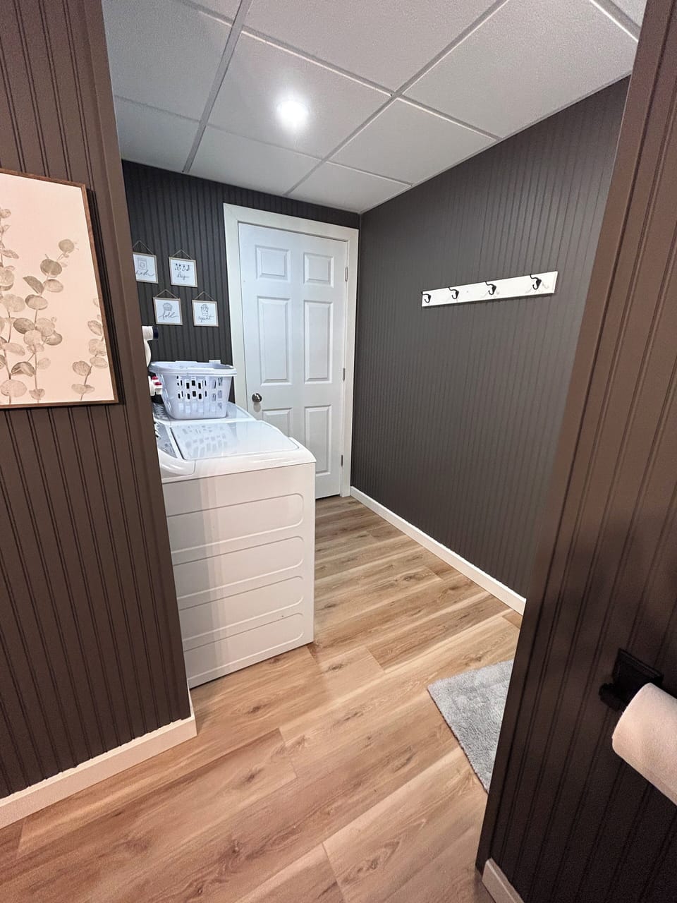 Basement bathroom has washer and dryer. 