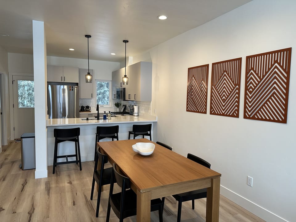 Dining area looking to kitchen.