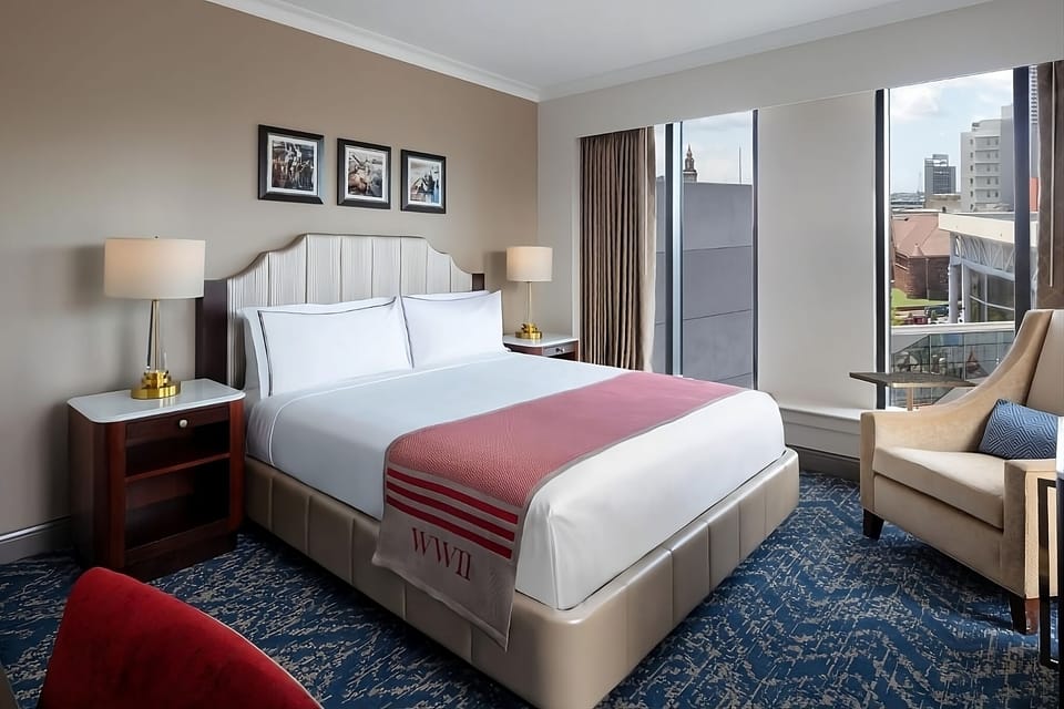 Drift off in a serene king room with soft linens.