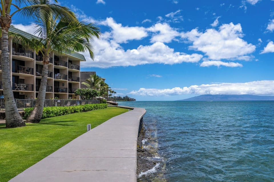 Ocean wall and lush tropical grounds just steps from your lanai