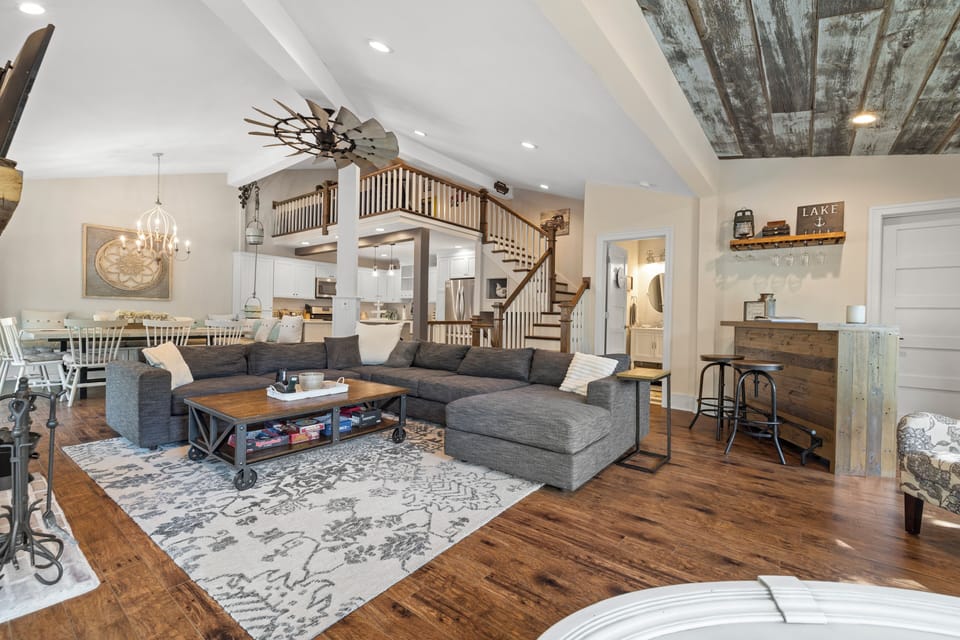 Open floor plan of large living room, dining room, kitchen, loft, bar area!
