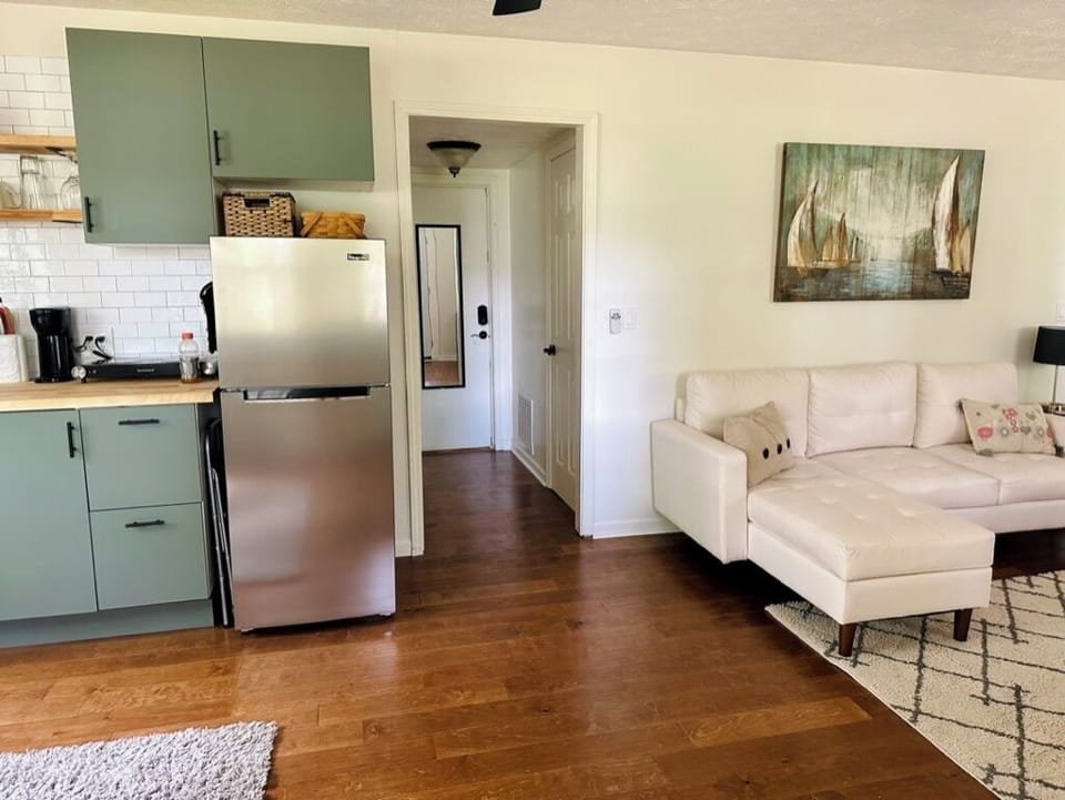 Hallway - Closet on right side, bathroom on left side, garage/laundry straight