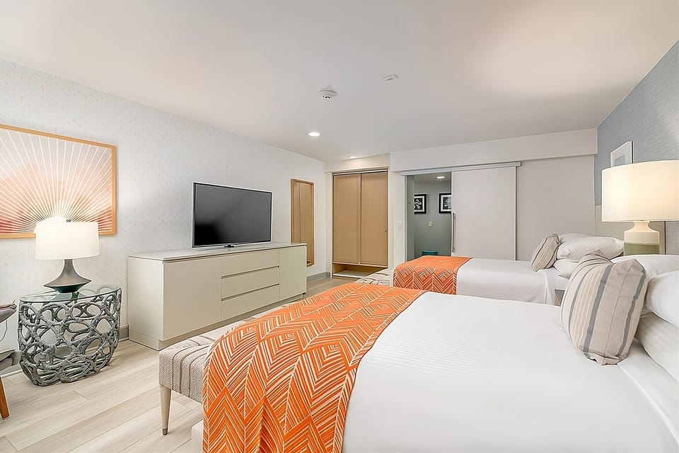 Relax after the beach with TV, storage, and soft lighting