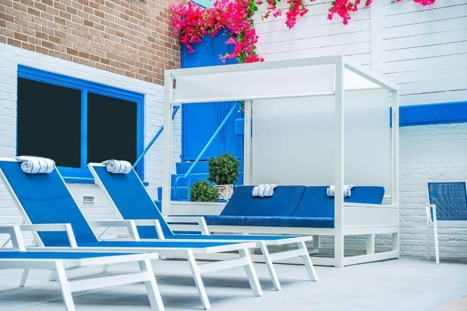 Soak up sunshine poolside in a public onsite pool with soft shade.