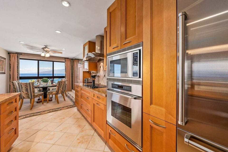 Cook with ease in a fully equipped kitchen featuring premium appliances.