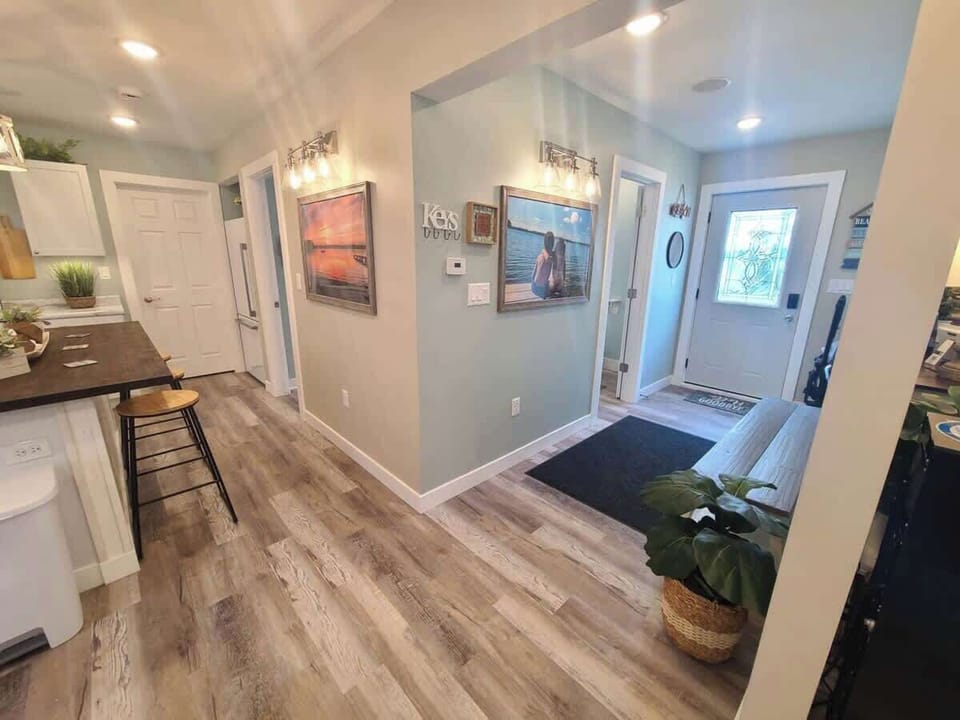 Entry, batjroom and kitchen view